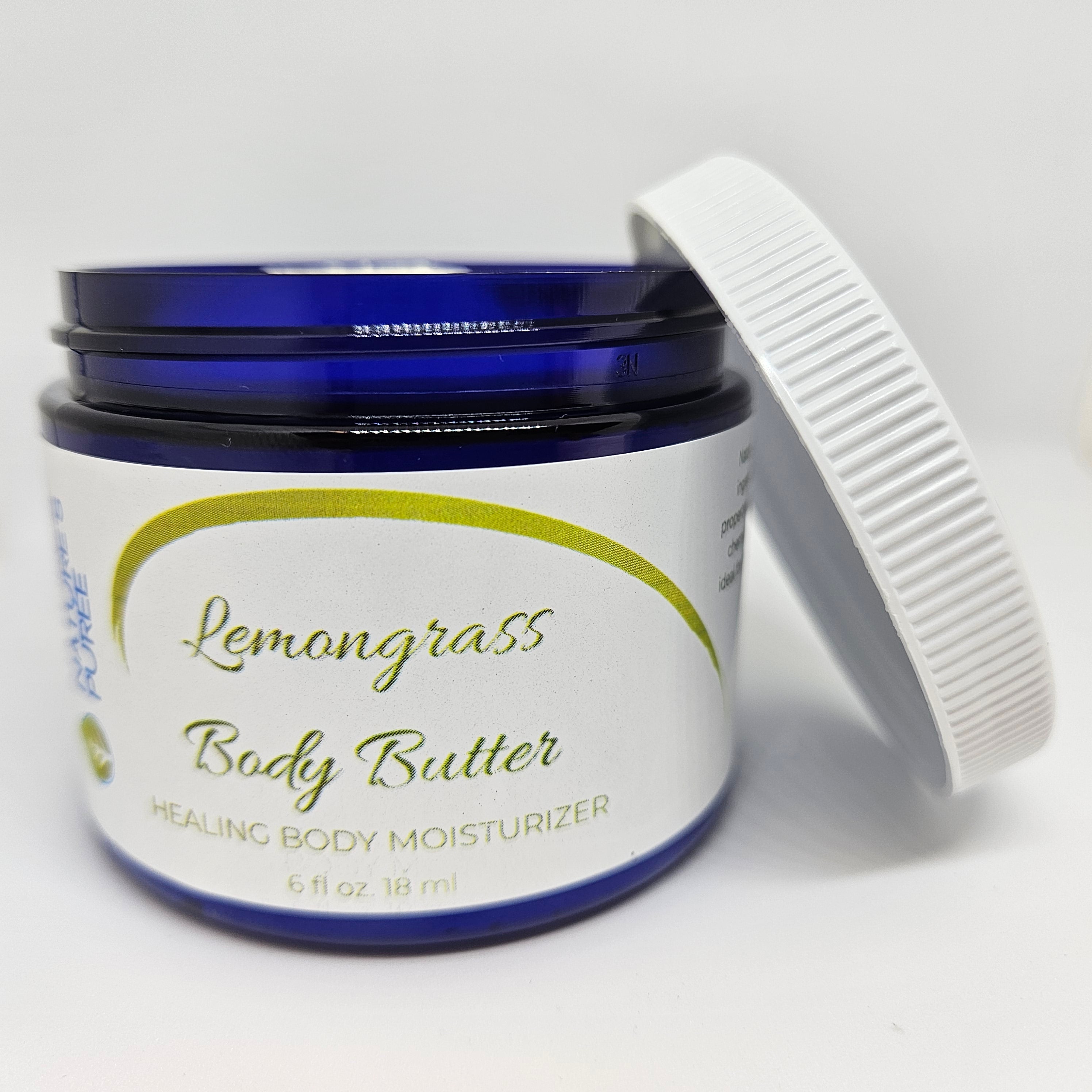 Jar of lemongrass body butter with a blue lid on a white background
